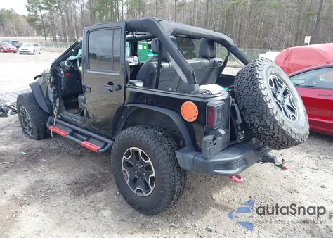 2015 Jeep Wrangler Unlimited Rubicon Hard Rock из США, поврежденный, VIN 1C4BJWFG7FL711036